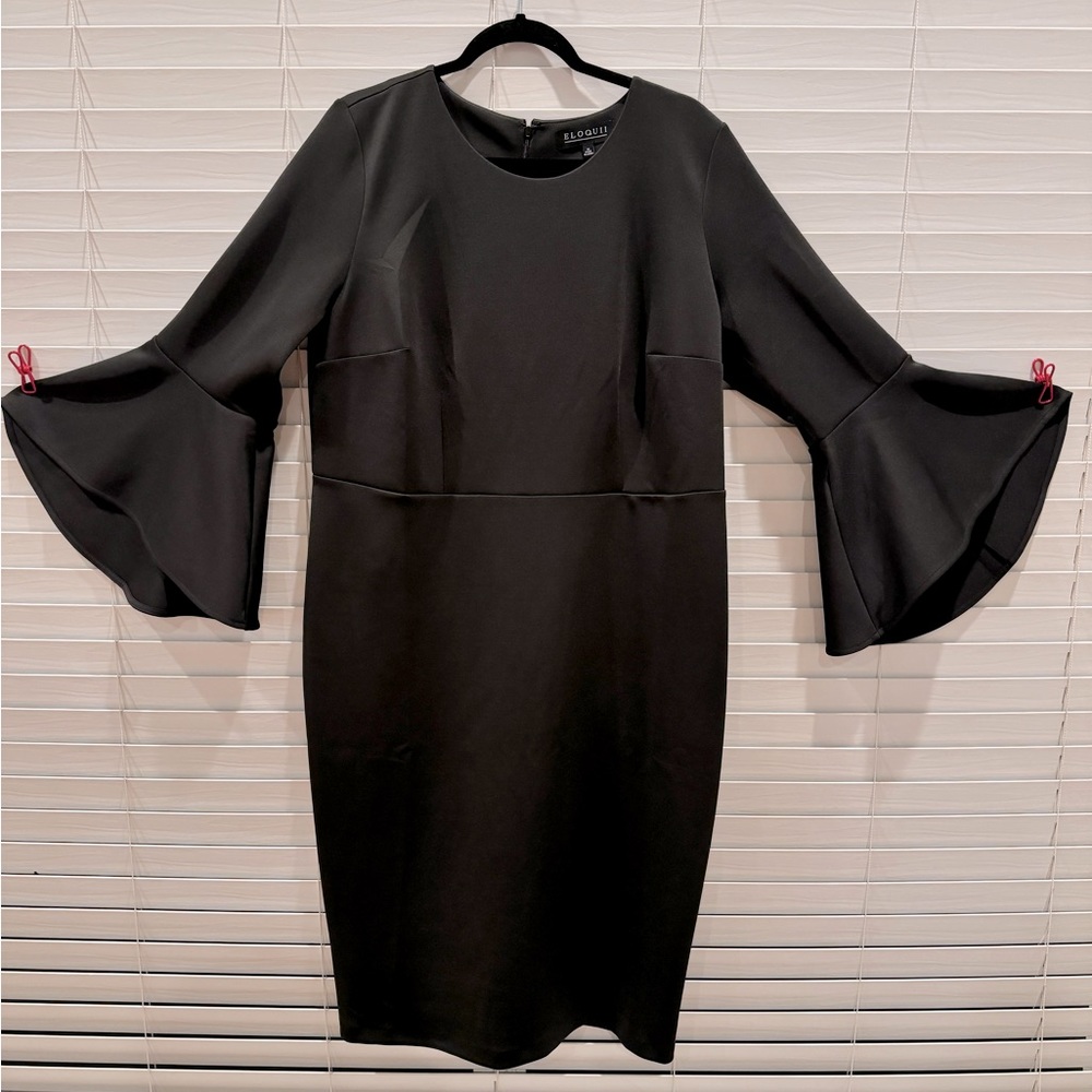 New With Tags!  Stunning Scuba dress from Elloqui in black with flare sleeves!